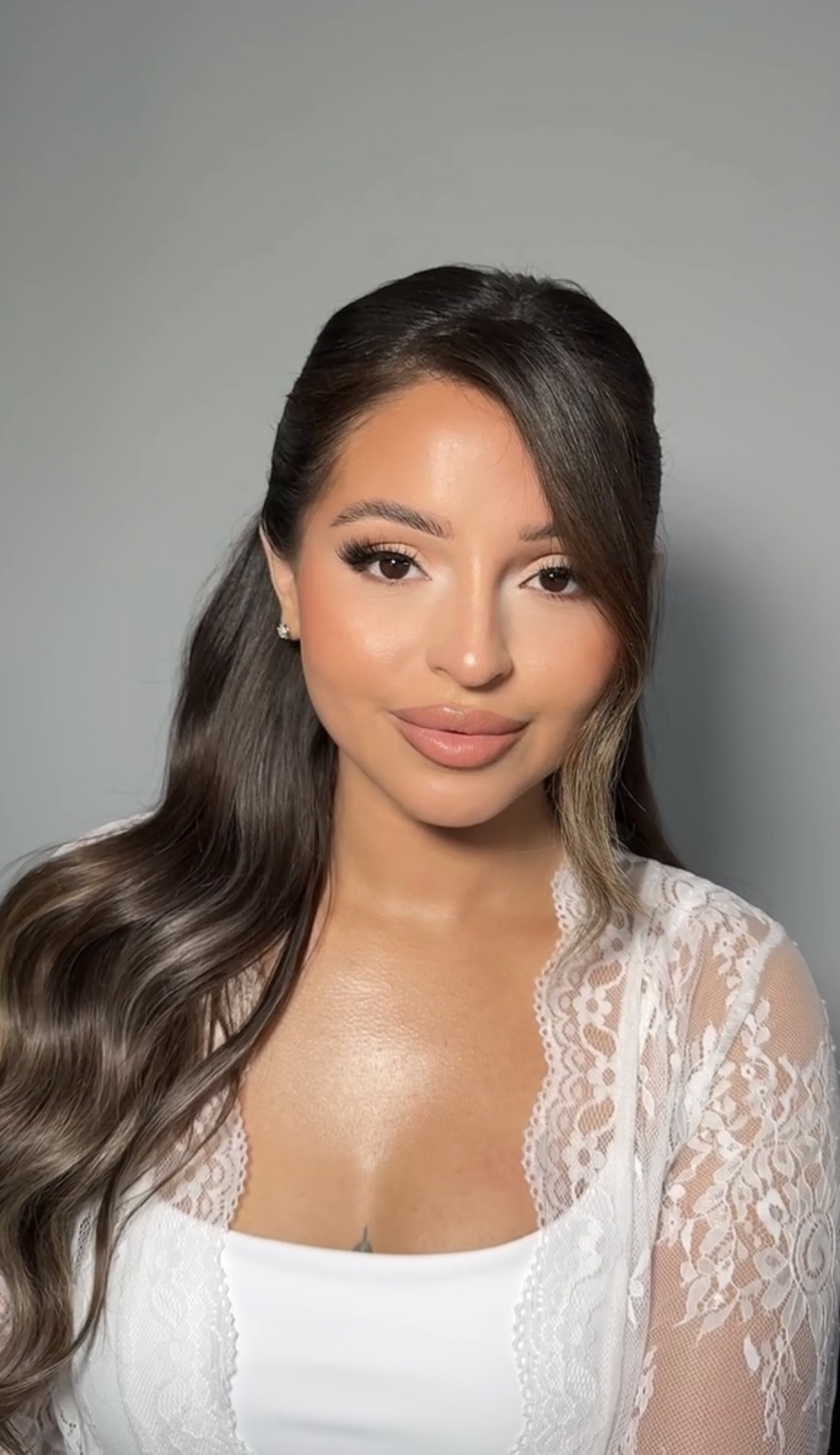 Peach-toned bridal makeup portrait