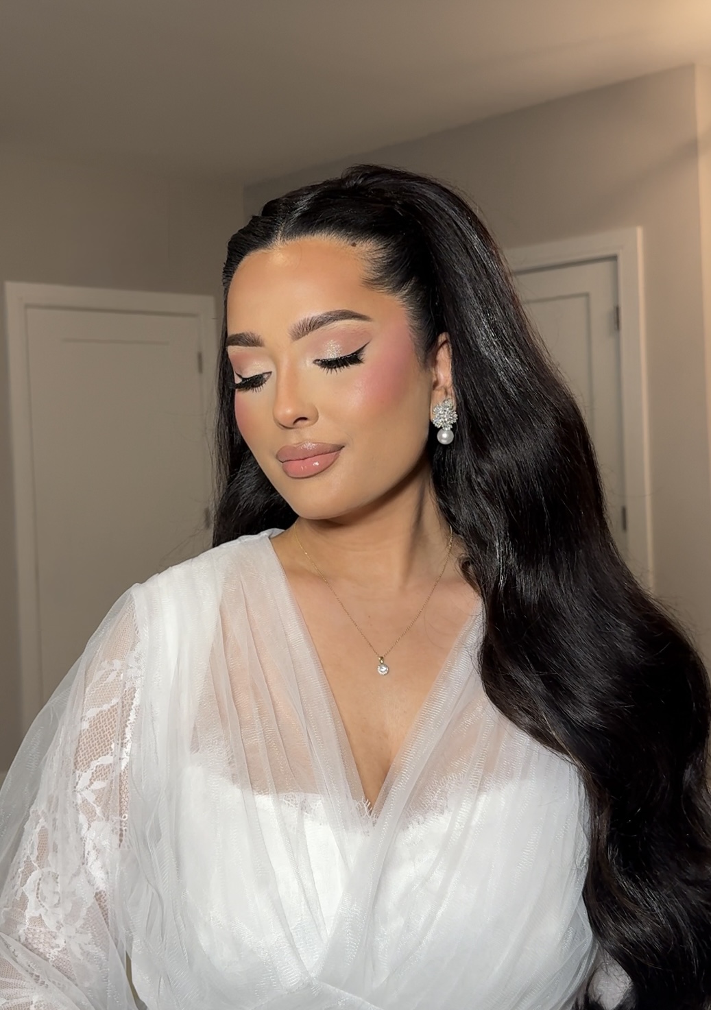 Bridal makeup with lace veil