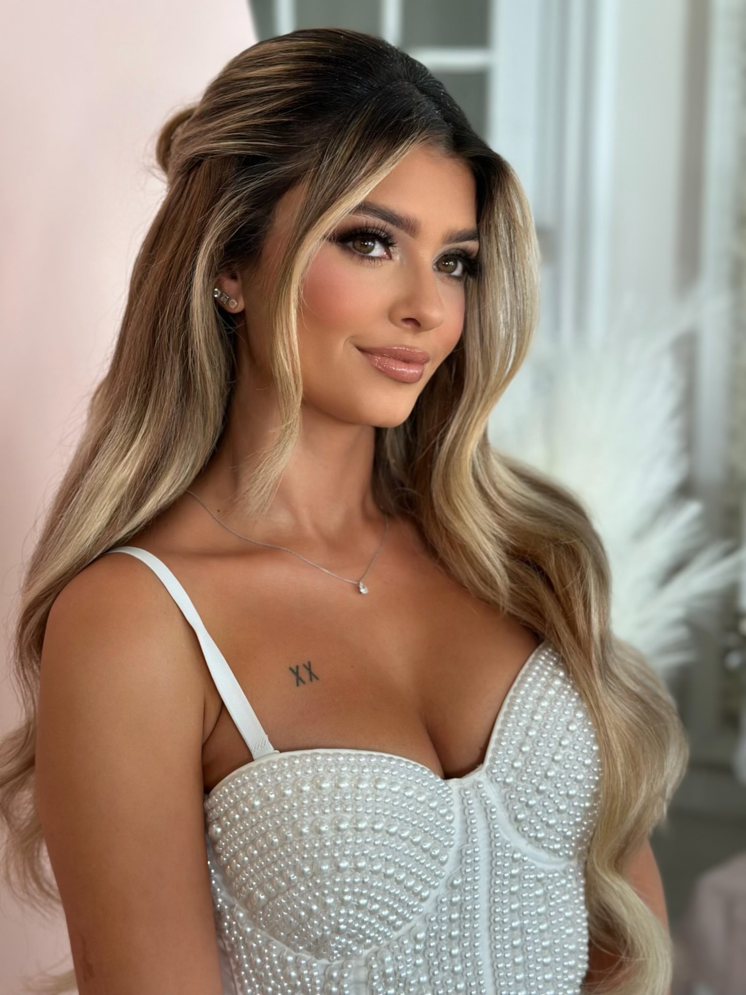 Brunette soft glam looking to the side